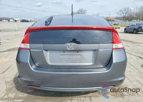 2010 Honda Insight Ex z USA, uszkodzony, nr VIN JHMZE2H77AS001110